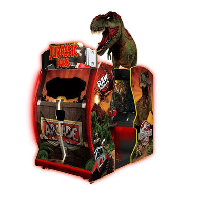 Arcade machine themed after Jurassic Park with a dinosaur figure on top.