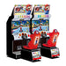 Mario-Kart-Arcade-GP-DX Pair of Mario Kart arcade machines with colorful designs and character graphics.