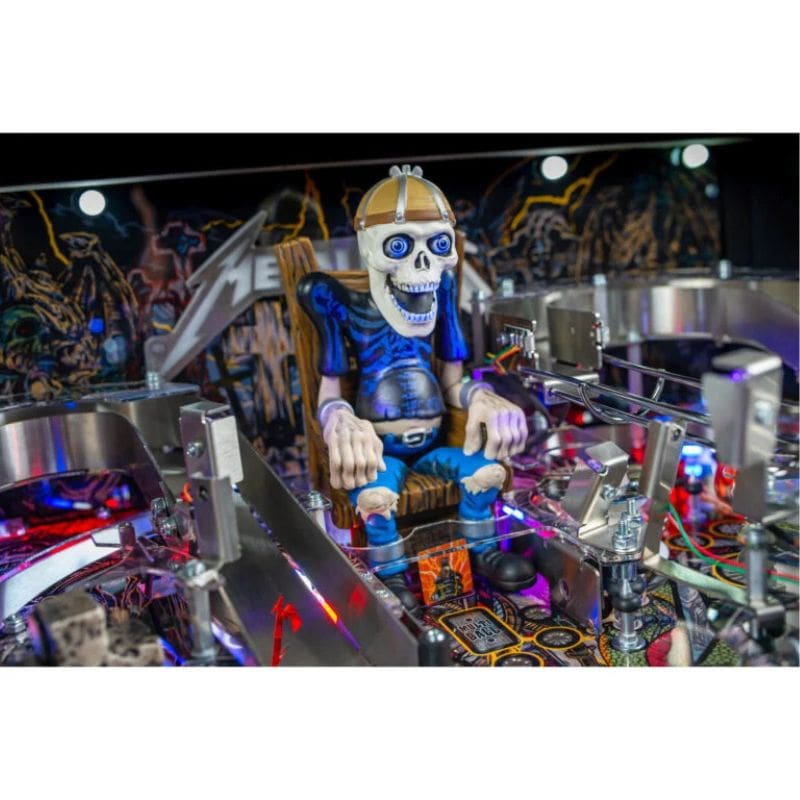 Metallica Pinball machine with a skeleton figure named sparky in a chair