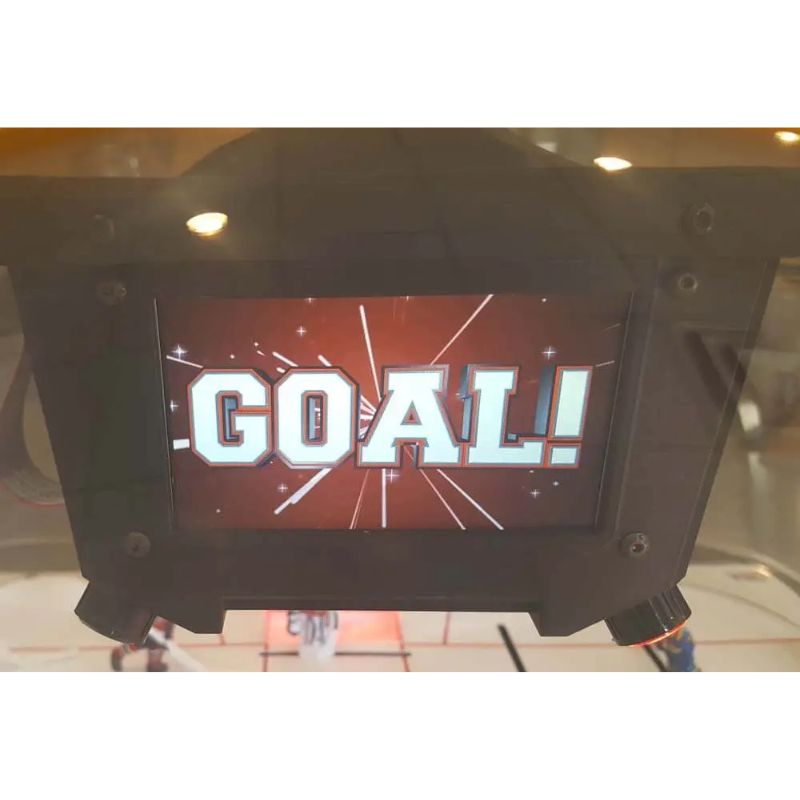 Digital display with 'GOAL!' text on a sports field background