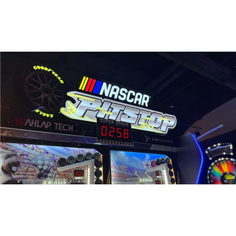 NASCAR Pit Stop Sign themed arcade machine with digital display and branding.