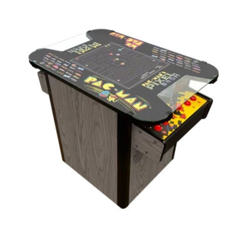 pac man cocktail table arcade game with glass top on a white background