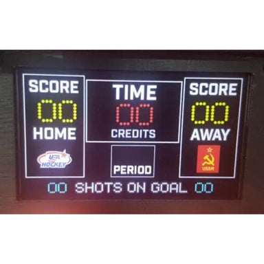 Digital scoreboard with LED display for a hockey game, featuring scores and time.