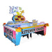 Colorful air hockey table with cartoon characters and 'Tom Kitchen Chaos' text on a white background