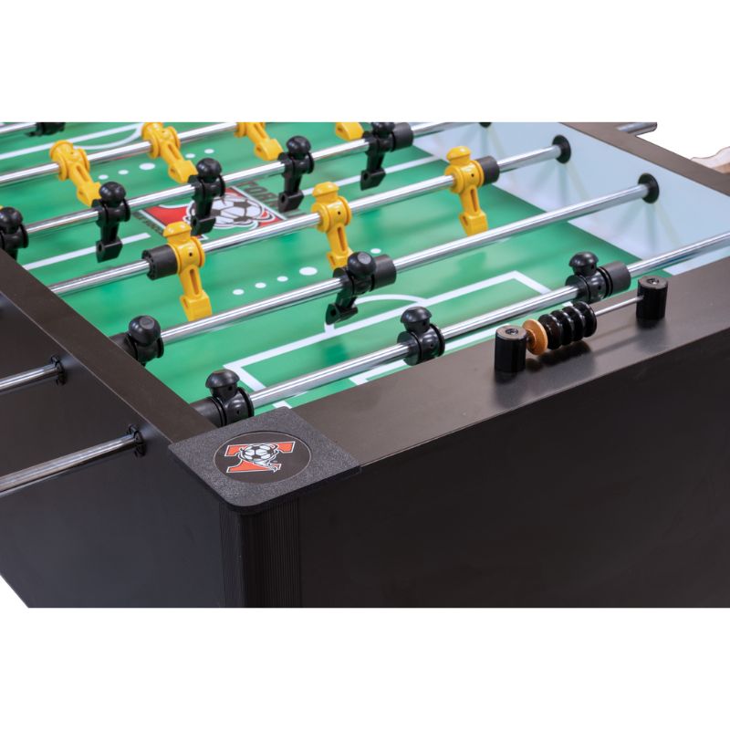 Close-up of a Tornado Classic II foosball table with green playing surface and metal rods.