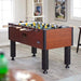 Tornado Elite Foosball table in a room with a sports-themed decor