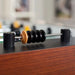 Close-up of a foosball table with a blurred background