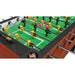 Close-up of a Tornado Elite  foosball table with green playing surface and wooden sides.
