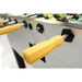 Close-up view of a foosball table handle from the Tornado Platinum Tour Edition, showcasing the yellow grip and durable construction. Ideal for recreational spaces like a mancave, it emphasizes quality and performance for foosball enthusiasts.
