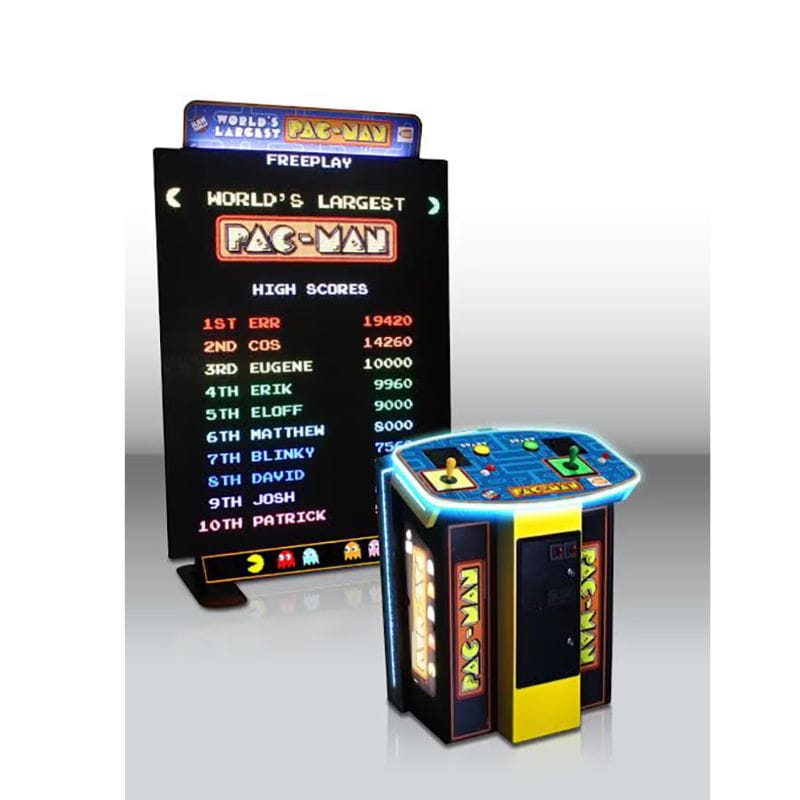 World's Largest Pac-Man arcade machine with digital scoreboard on a white background