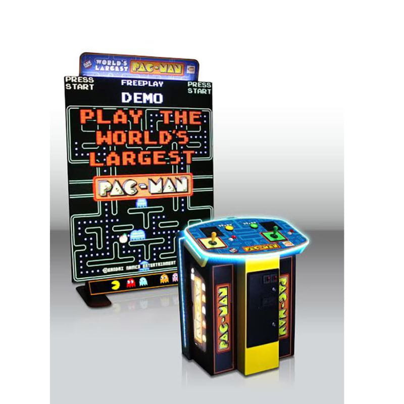 World's Largest Pac-Man arcade game with promotional sign on a white background